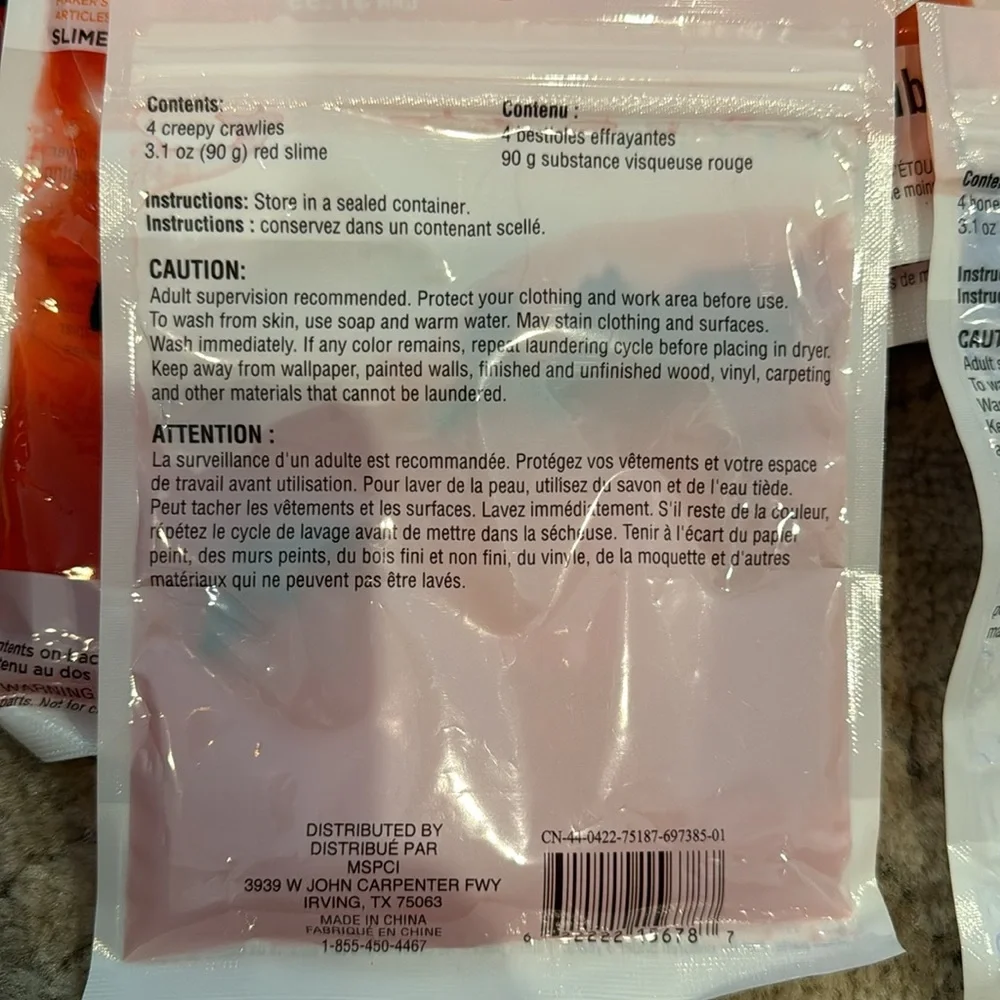35 packets of Slime with creepy crawlers in it. 18 reddish and 17 Blue/purple.
